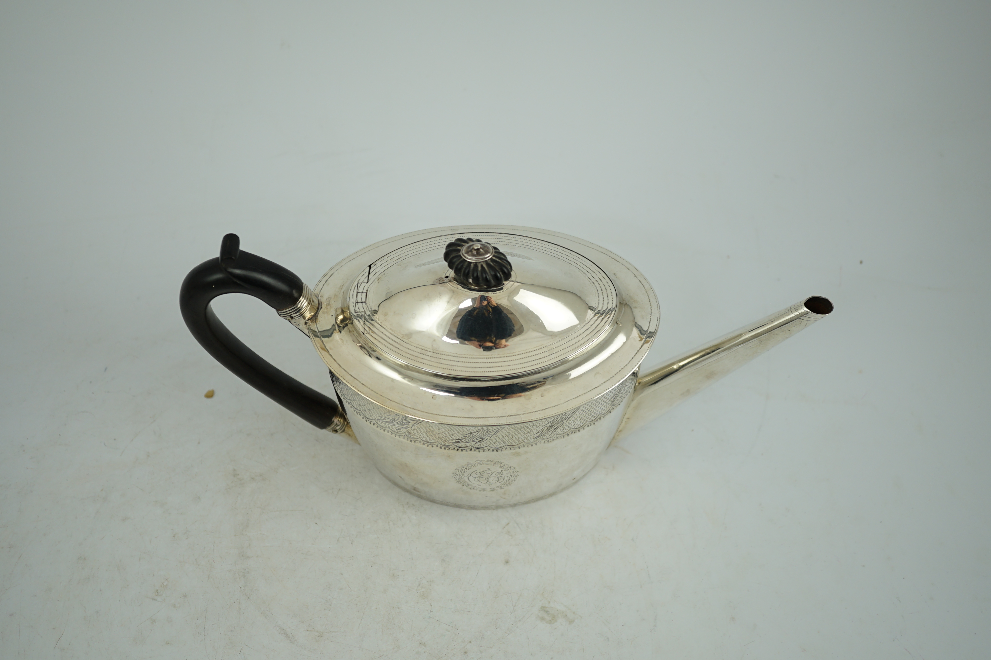 A George III engraved silver oval teapot, Chawner & Emes, London, 1797, gross weight 15.5oz.